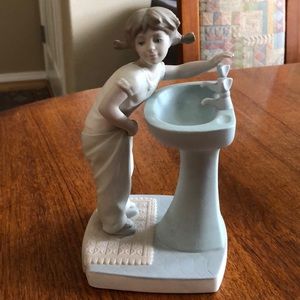 Porcelain figurine “girl at sink”